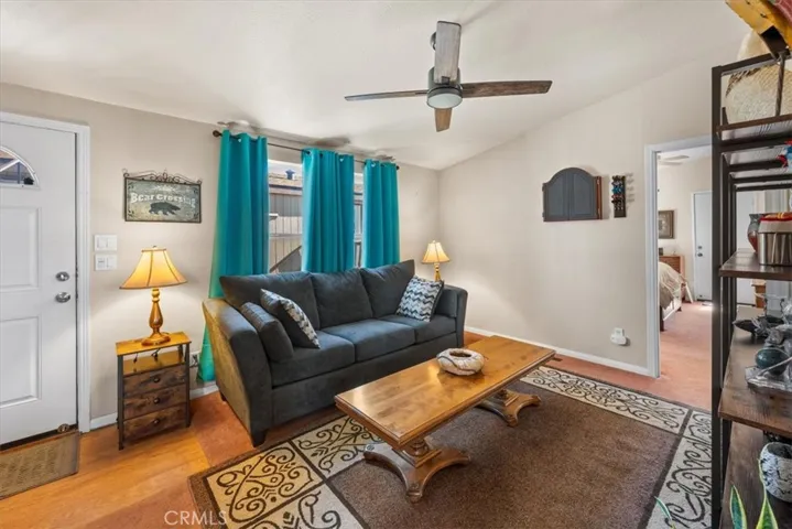 Living room and showing access to the master bedroom