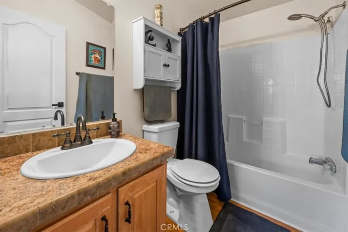 Bathroom with full tub and shower