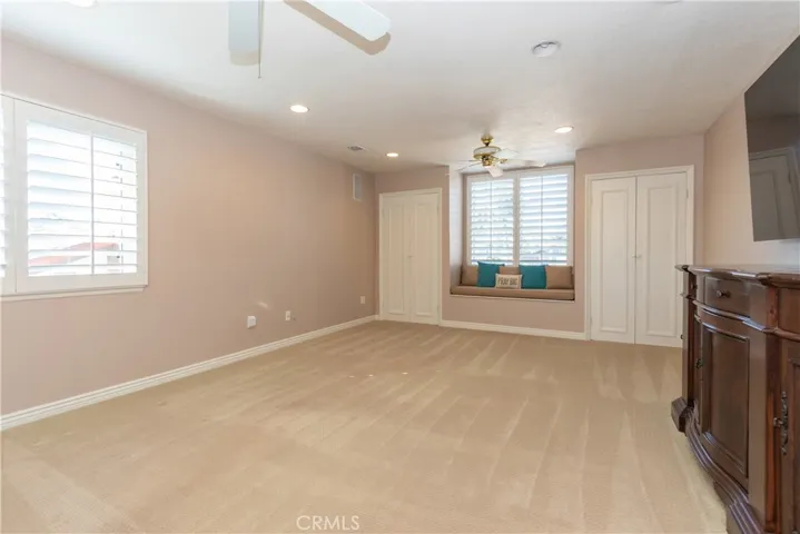 Recessed lighting, plantation shutters, and ceiling fans in the bonus.