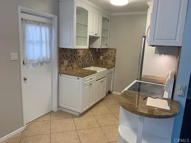 2 Bed Kitchen with back door.