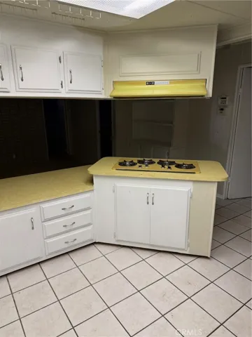 View from corner of kitchen to the stove top