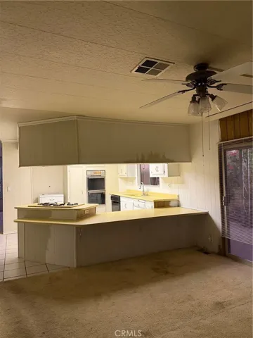 view from family room to kitchen
