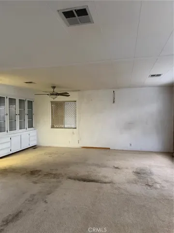Formal dining room area adjacent to the living room