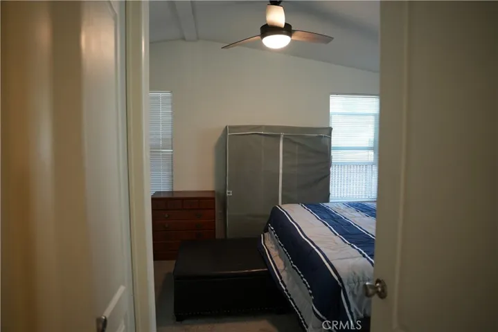 Spacious Primary with ceiling fan, walk-in closet and attached bathroom