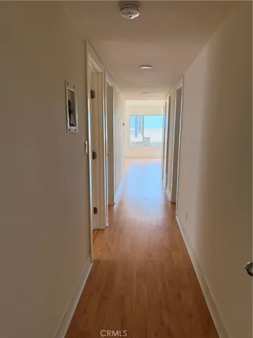 Hall from 3-bedrooms to living space and BEACH!!