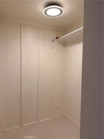 Primary walk-in closet.