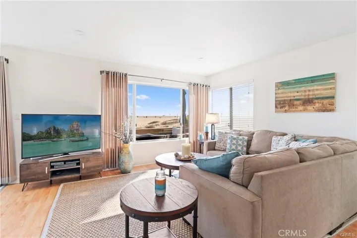 Spacious living room with panoramic views. (Note: The home is currently unfurnished, these photos taken previous to this listing.)