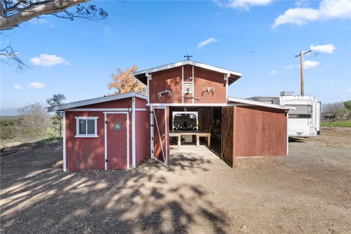 work shop could be converted back to a barn currently used as workshop