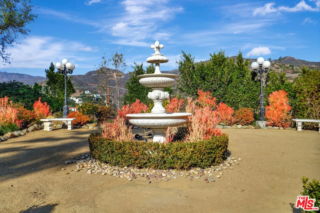 Fountain at E end of driveway