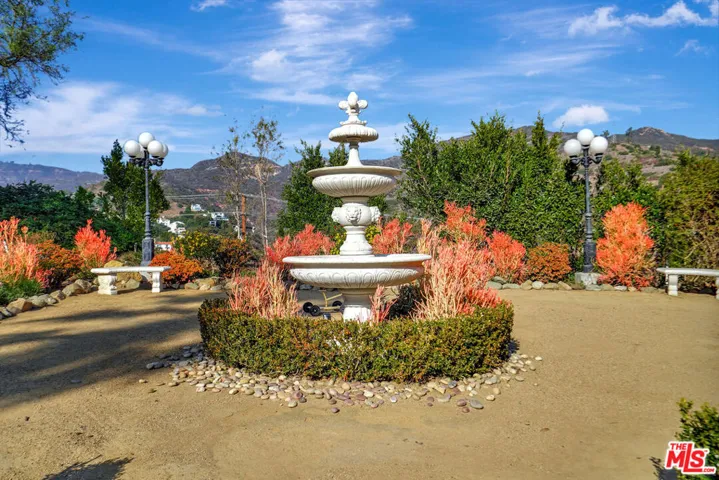 Fountain at E end of driveway