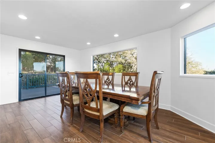 Off the kitchen is an area that could be used as a large dining area or a family room, the choice is yours depending on your needs.