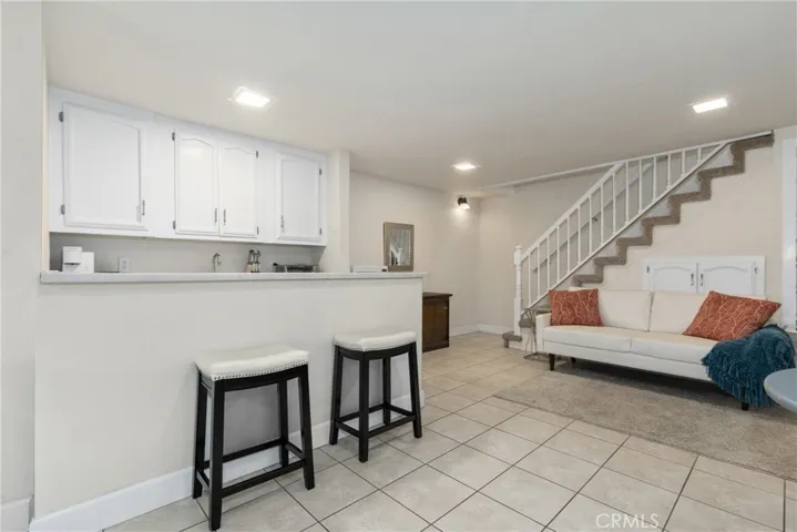 Downstairs we find an awesome guest suite that could be used for friends, family or potential income.