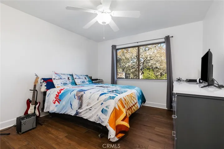 Bedroom 3 also has wood tile floors, ceiling fan and radiant floor heating.