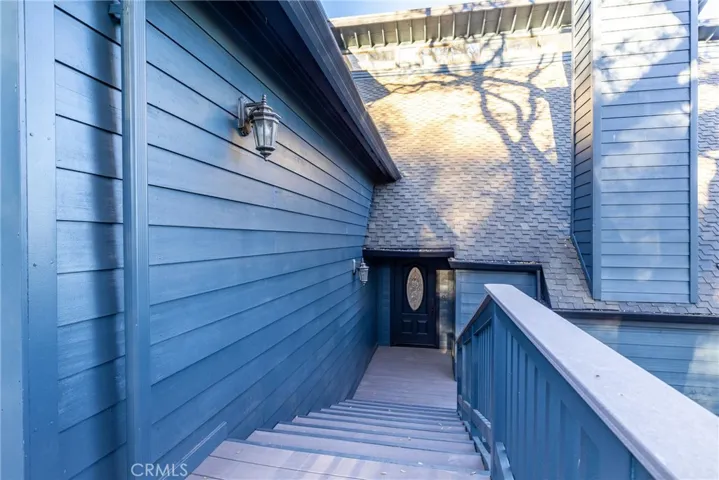Steps lead you to the front door.