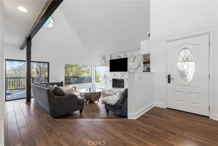 Wood tile flooring runs throughout most of the home.