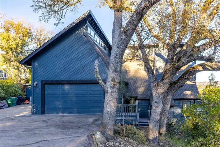 The home's exterior was recently painted a striking shade of deep blue.