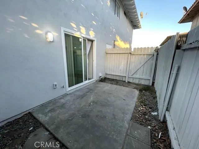 Patio has access to the back parking area.