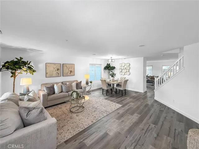 Bright and inviting living room with an open layout and abundant natural light.