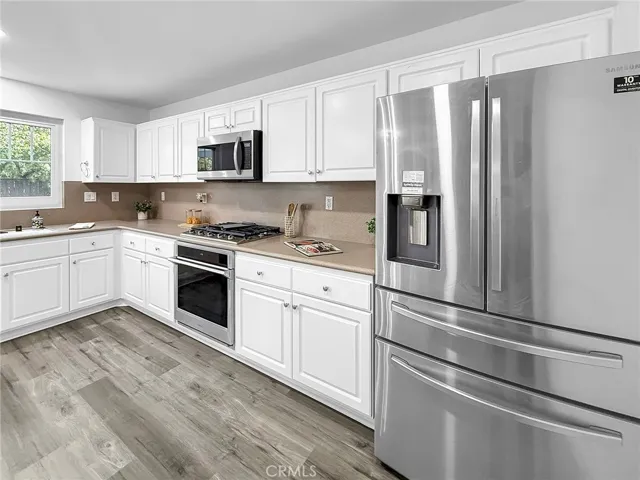 Stylish kitchen countertops showcasing quality finishes and ample workspace, perfect for cooking, prep, and entertaining.