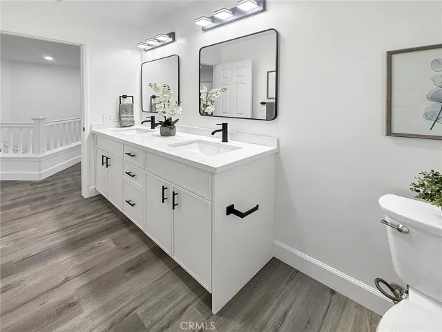 Well-appointed secondary bathroom with modern fixtures and a functional layout for family or guest use.