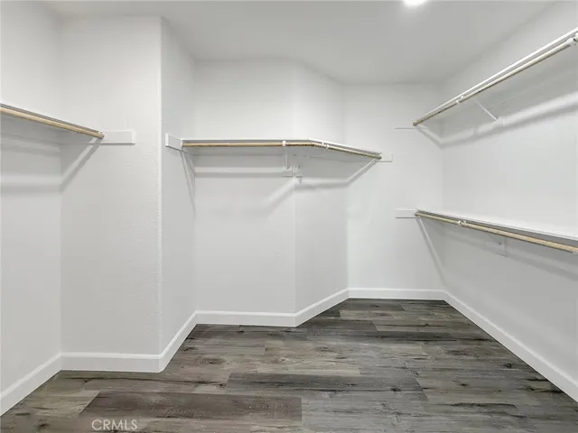 Spacious walk-in closets offering ample storage and organization for clothing and accessories.