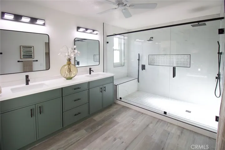 Elegant primary bathroom featuring modern finishes, a functional layout, and a spa-like atmosphere for relaxation and comfort.
