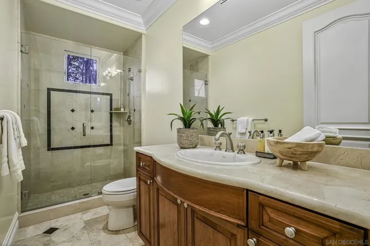 Beautiful full bathroom adjacent to office.
