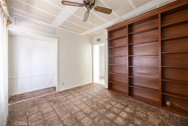 4TH BEDROOM HAS BUILT IN BOOK SHELVES CLOSET DOOR REMOVED