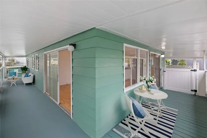 virtually staged large wrap around covered patio