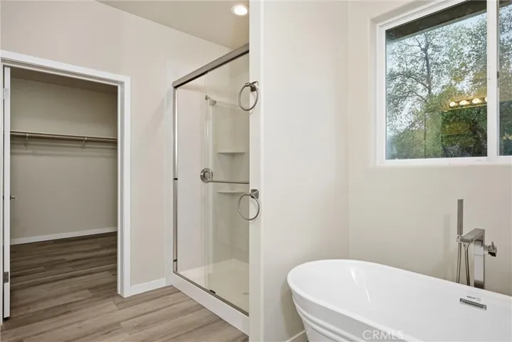 Primary bath shower and soaking tub.