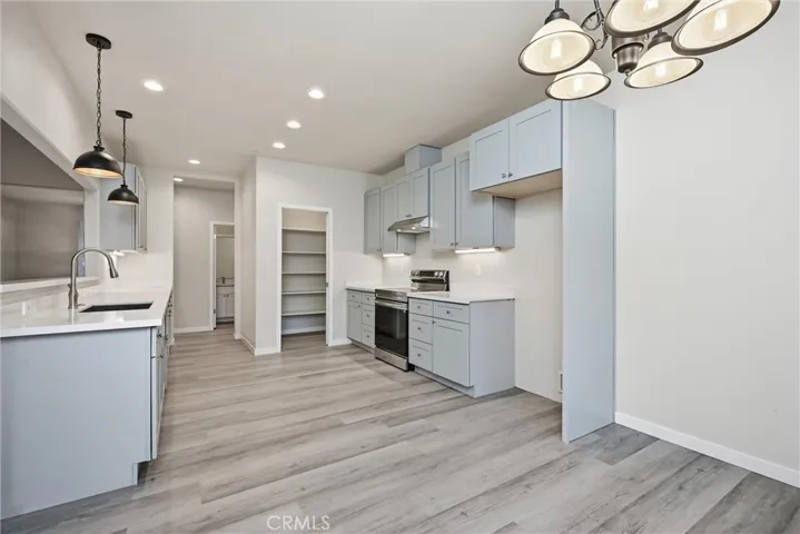 Kitchen is light and bright with huge pantry.