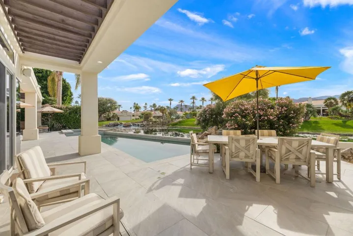 Backyard table pool mountain view