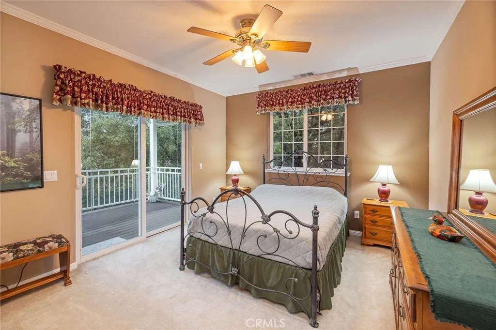 upper guest bedroom with private balcony