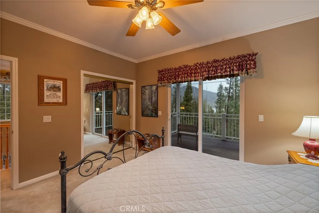 Primary suite upper level with private balcony