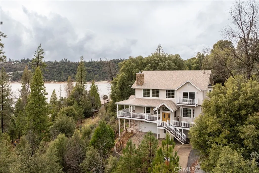drone shot of home and Lakeview