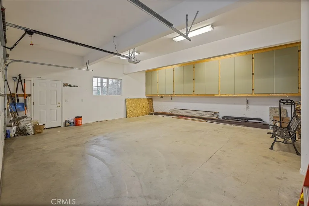 garage with lots of cabinets