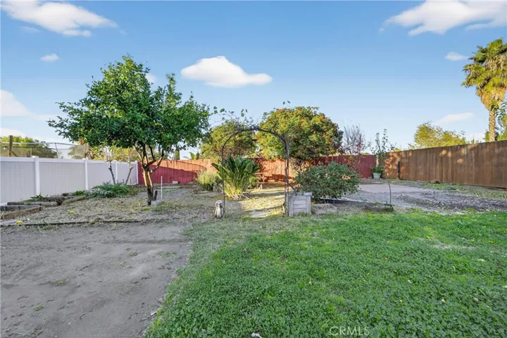 Generous yard ready for a pool or garden