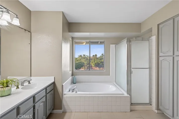 Primary bath with separate tub and shower