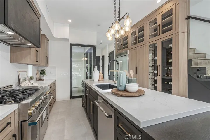 CUSTOM CABINETS WITH WINE WALL