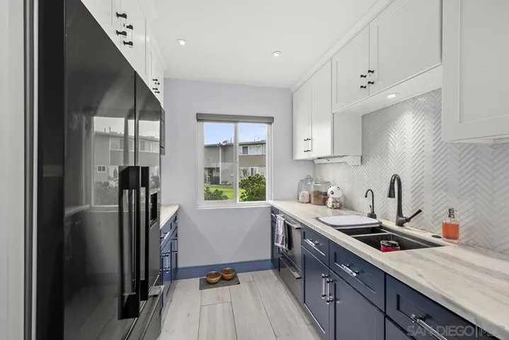 Kitchen was remodeled in 2021 with beautiful cabinetry,  quartzite counter tops, top of the line under cabinet system (Legrand Adorne Under-Cabinet Lighting and Power System), Bosch gas range, Faber vent hood)
