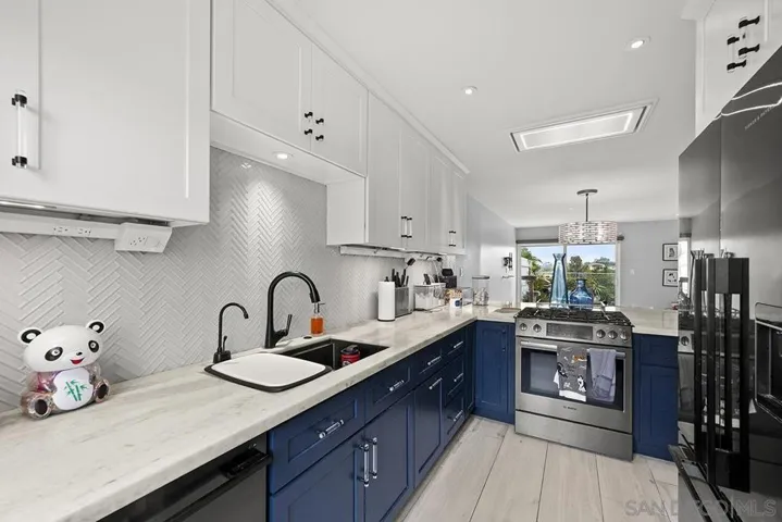 Kitchen was remodeled in 2021 with beautiful cabinetry,  quartzite counter tops, top of the line under cabinet system (Legrand Adorne Under-Cabinet Lighting and Power System), Bosch gas range, Faber vent hood)