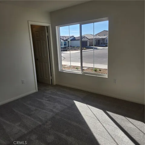 front bedroom with view to street