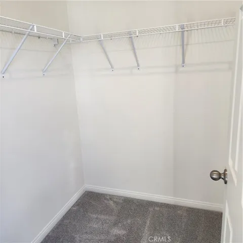 front bedroom with walk-in closet