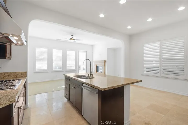 KITCHEN OPENS TO FAMILY ROOM