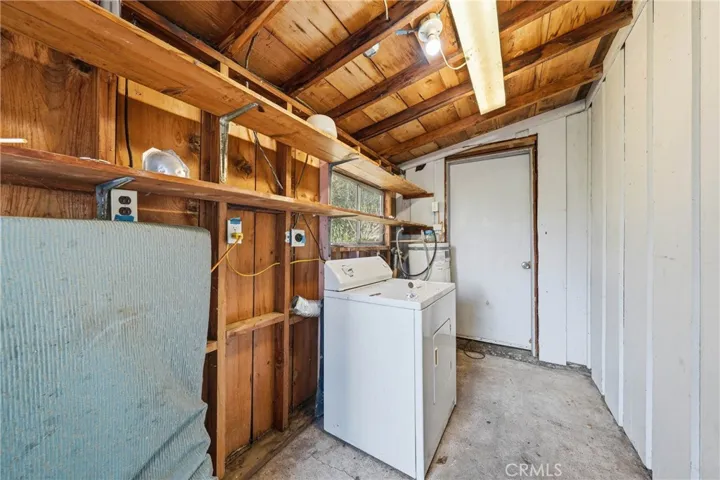 Laundry Room, door leads into unifinished bathroom