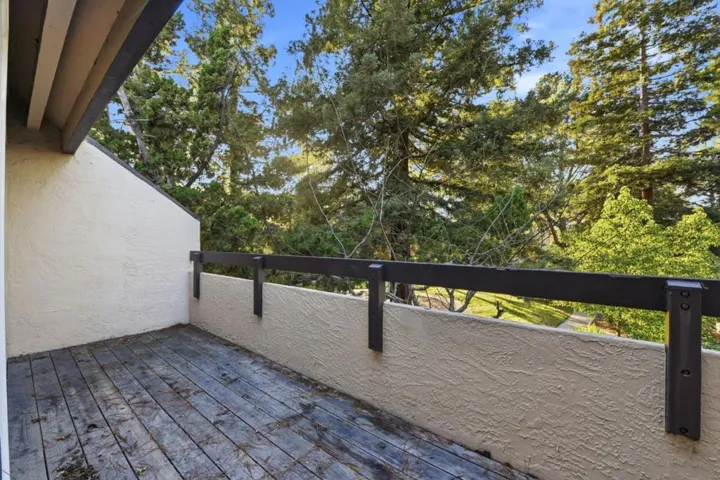 Spacious patio with privacy and views of the numerous trees.