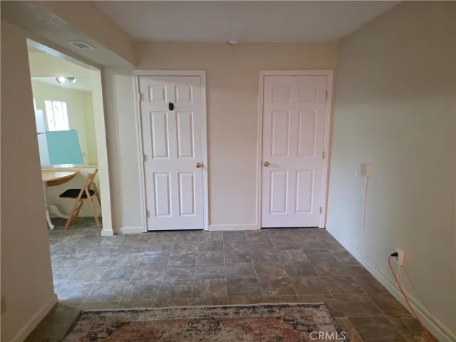 Possible 4th bedroom, office, etc. with small closet door on the left