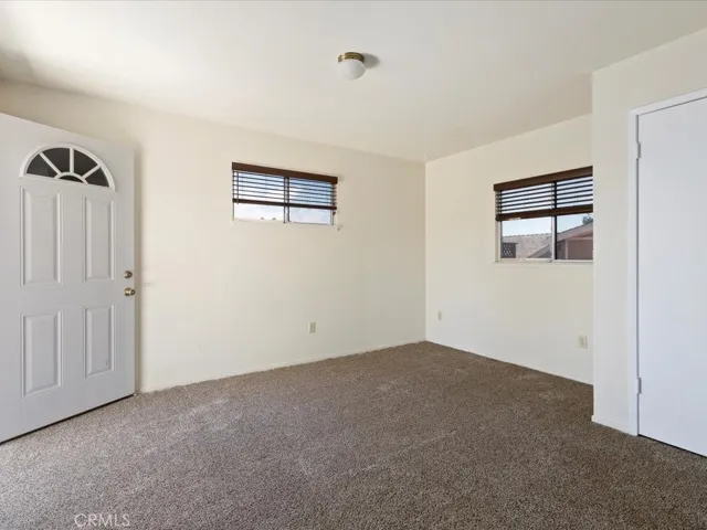bedroom one downstairs has an outside entrance and inside entrance
