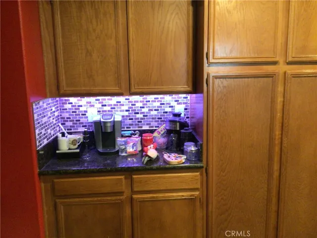 Kitchen area bar and cabinets