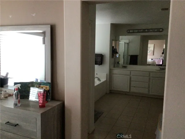 upstairs Master bedroom walkway to bathroom